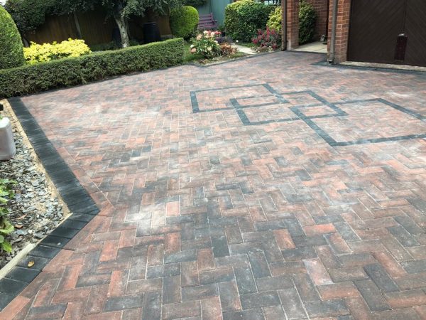 Our workers paving a driveway in Goodyers End