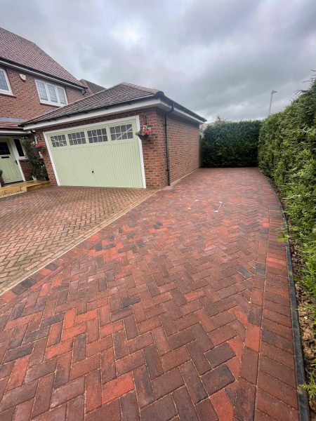 Our workers paving a driveway in New Town