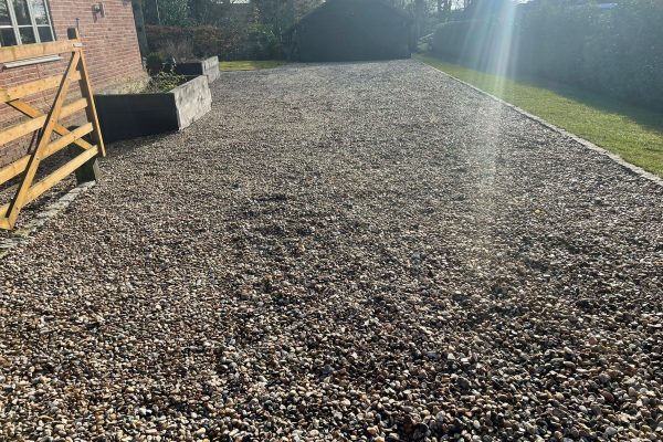 Our workers on a driveway in Attleborough