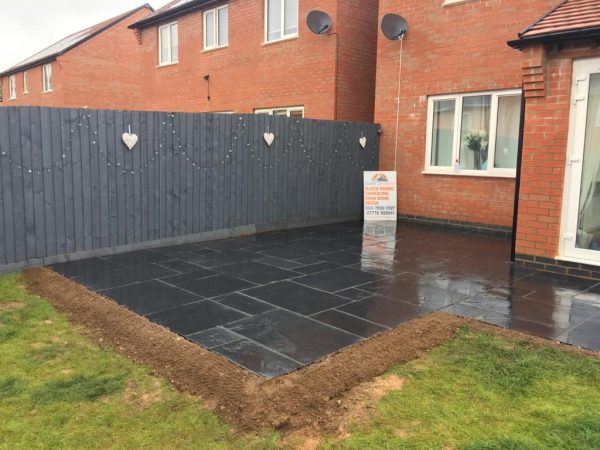 Our workers on a patio in Langley Green