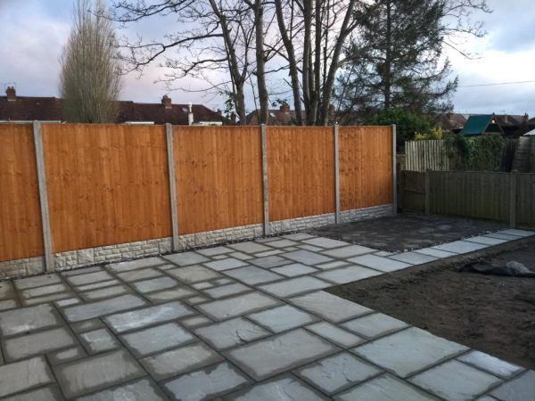 Indian Sandstone Patio With New Fencing In Rugby (5)