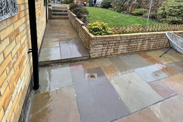 Tegula Paved Driveway With New Fencing And Sandstone Slabbed Back Patio In Rugby (11)